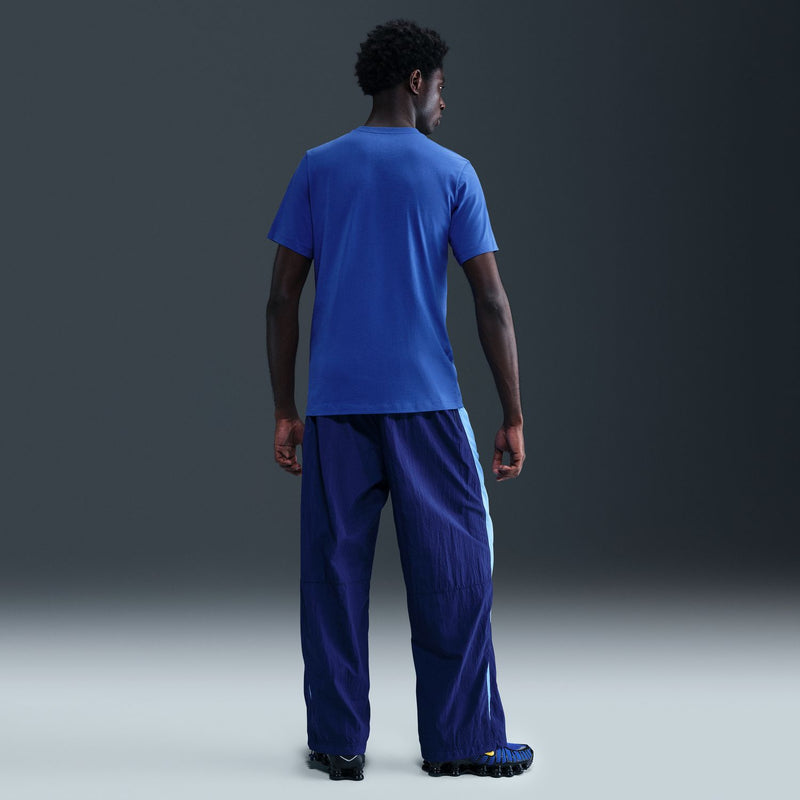 Men's blue T-shirt, back view with crew neck