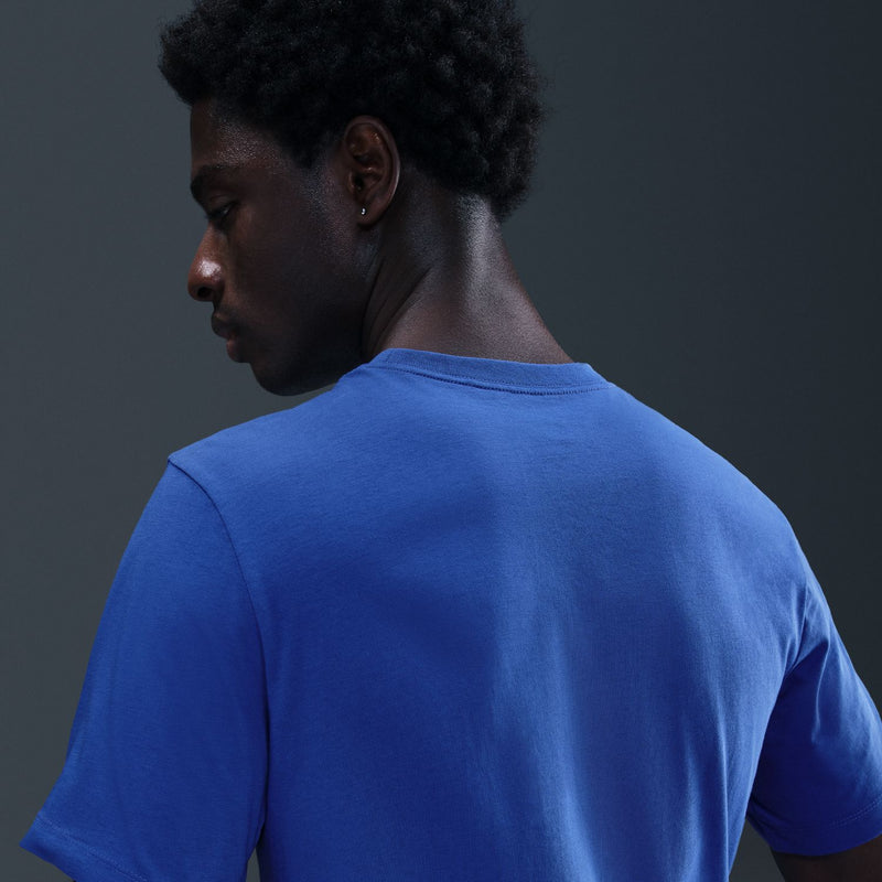 Men's blue T-shirt back view from side