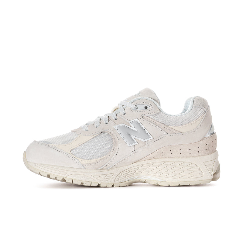 Women's low-top sneakers, lace-up front with cream and light gray overlay details