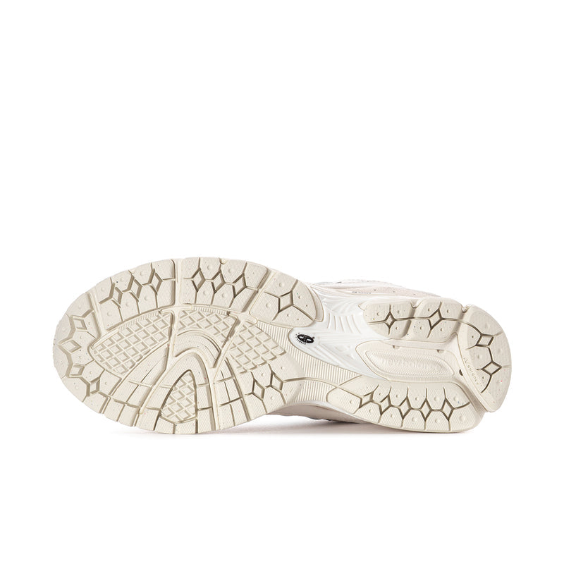 Women's sneaker outsole with textured tread on light rubber sole