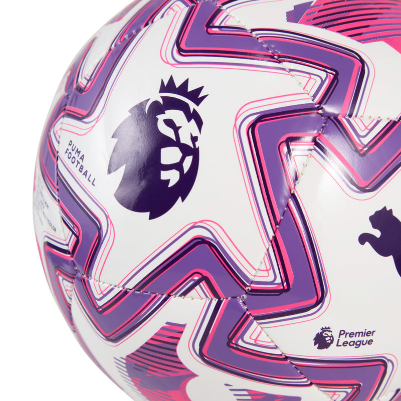 Close-up white mini soccer ball with purple/pink Premier League lion and Puma logo
