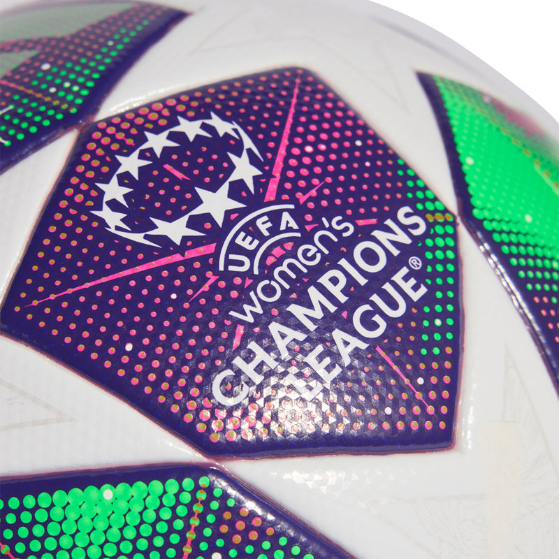 Close-up of purple logo panel with multicolor dots on white soccer ball