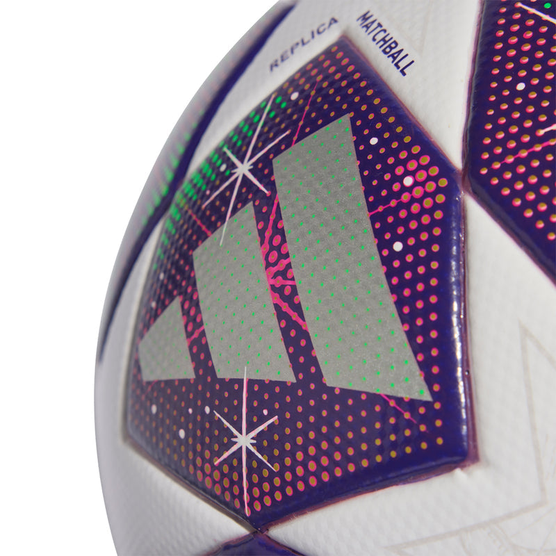 Close-up of purple-blue geometric panel with green accents on white soccer ball