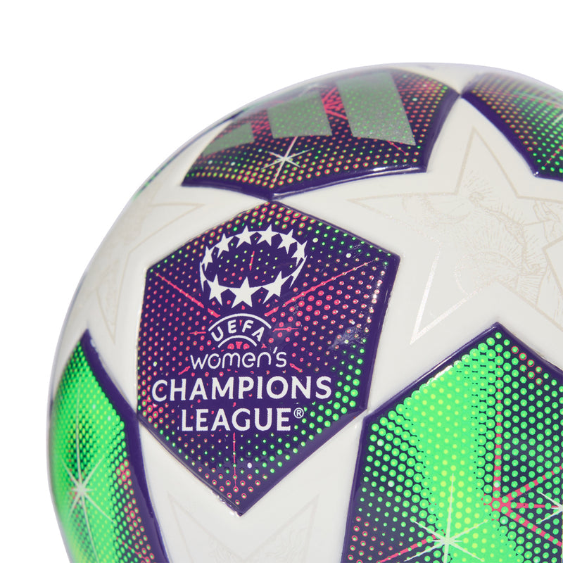 Mini soccer ball close-up with UEFA Women’s Champions League badge on white