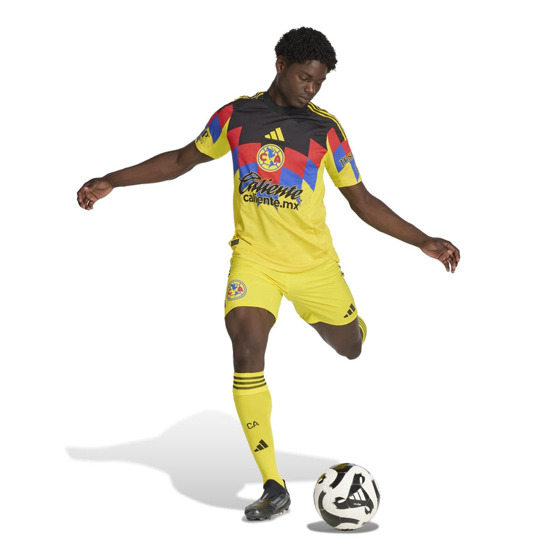 Men's Club America home jersey, yellow front with black geometric shoulder and multicolor sleeves