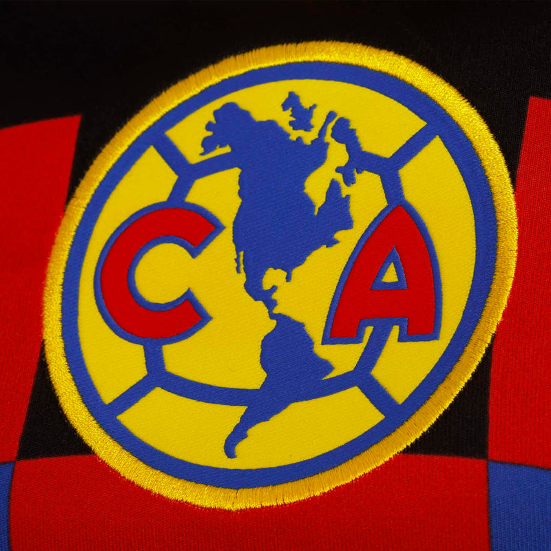 Club America crest patch on yellow and black jersey front