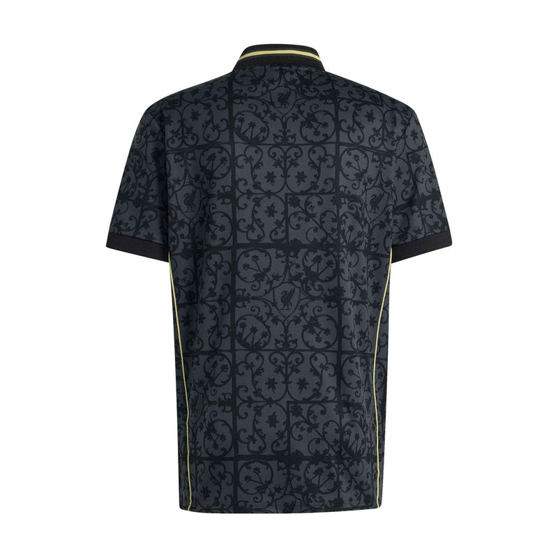 Men's navy Liverpool jersey back view with gold side piping and all-over pattern.