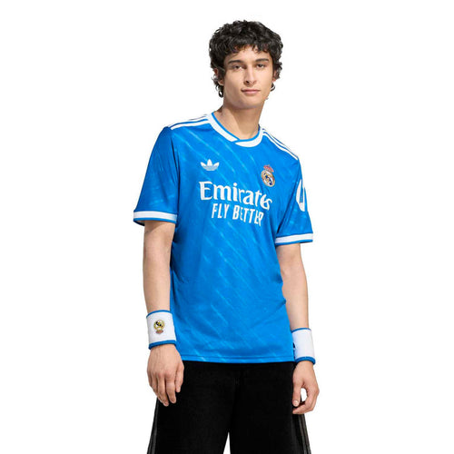 Men's blue Real Madrid third jersey with Emirates Fly Better and white trim