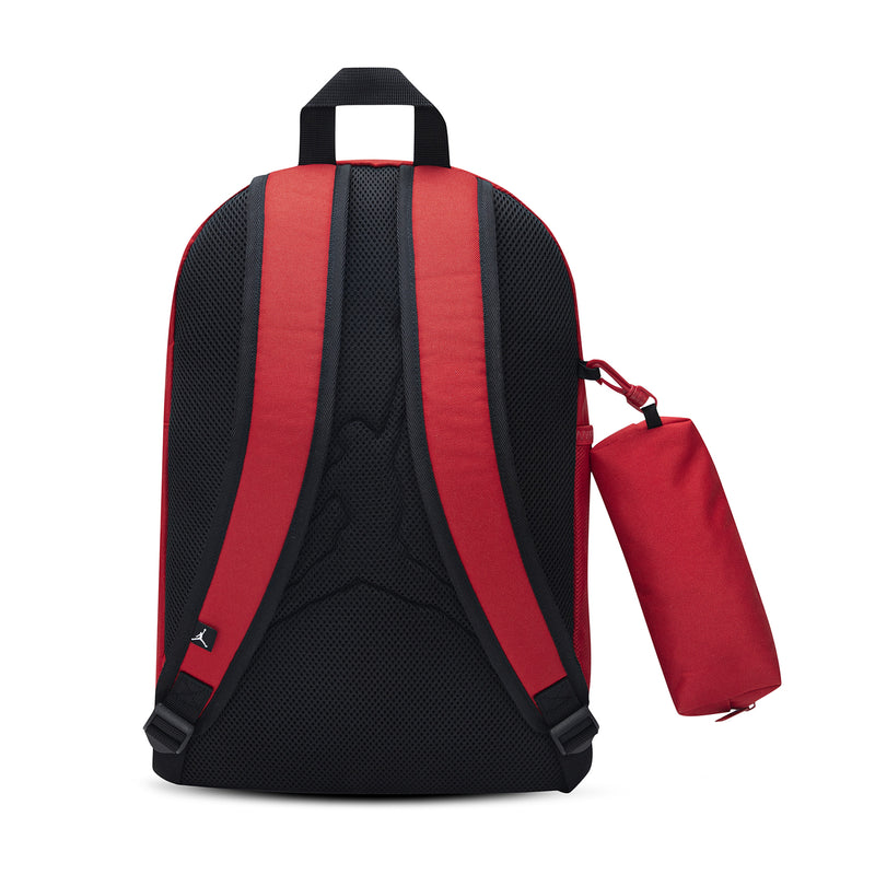 Red backpack back with padded straps, breathable mesh panel, and pencil case