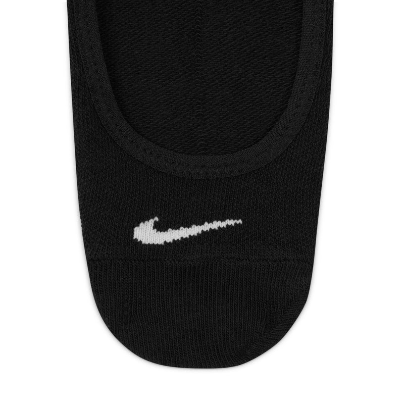 Black footie sock close-up with white logo on the cuff