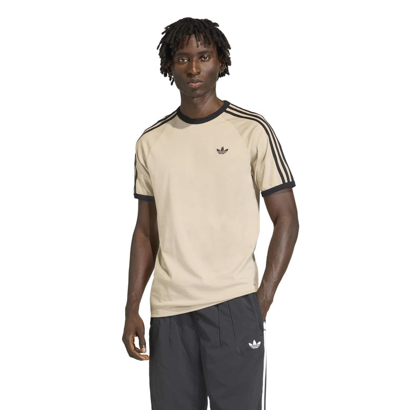Men's stone khaki adidas tee with black shoulder stripes and small chest trefoil logo