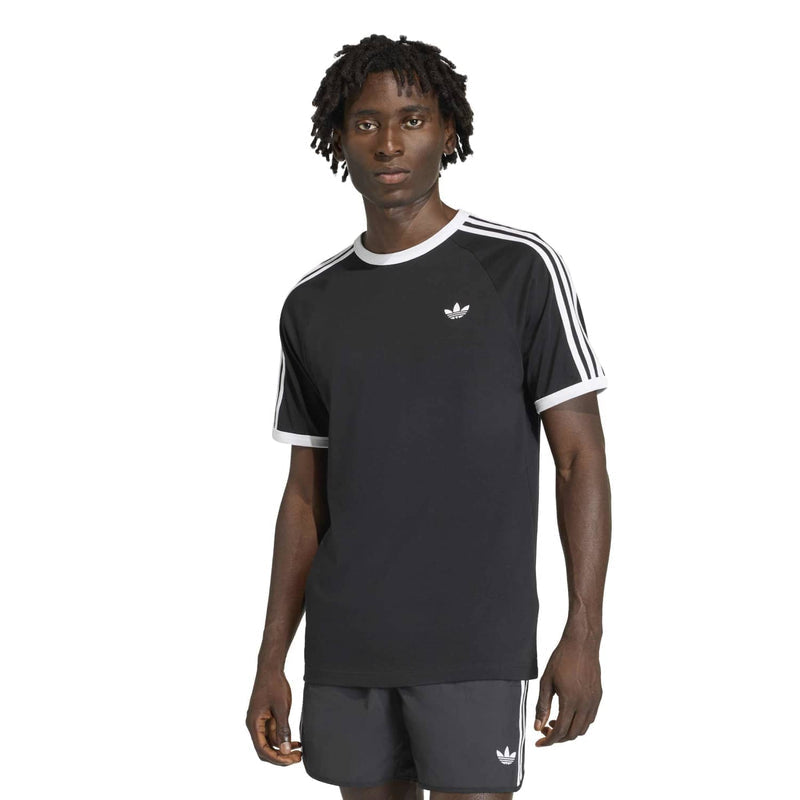 Black men's crewneck T-shirt with three white sleeve stripes and small trefoil logo