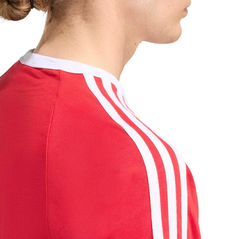 Red Adidas 3-Stripe tee shoulder with white triple sleeve stripes and crew neck trim