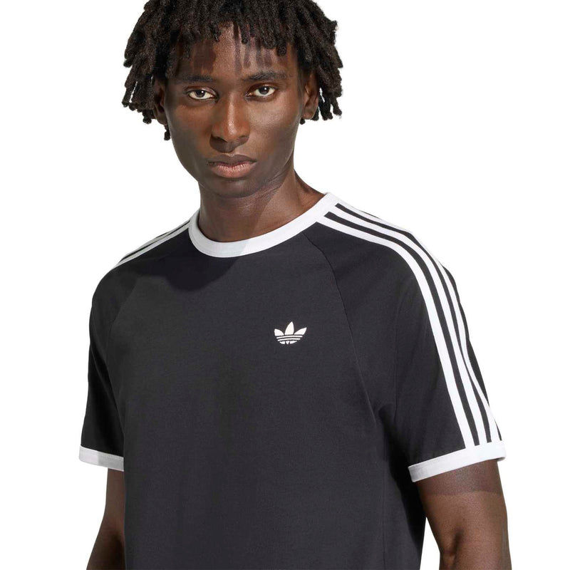 Black men's crewneck T-shirt with trefoil chest logo and three white sleeve stripes