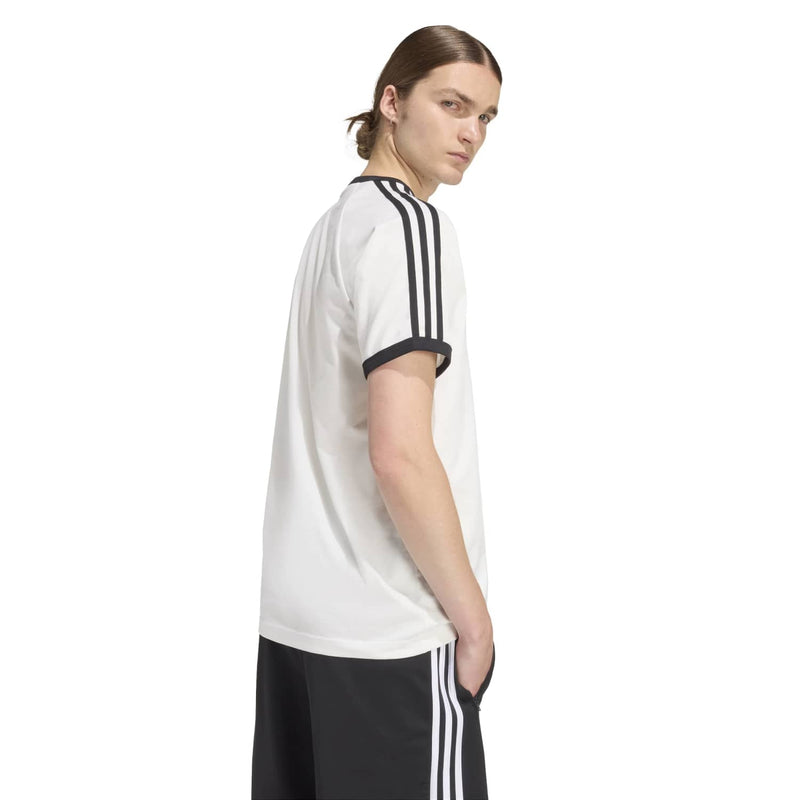 White adidas 3-stripe T-shirt shown from side profile with black sleeve stripes