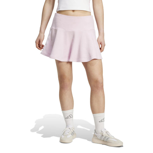 Women’s pink flared mini skirt, slightly pleated hem, side view