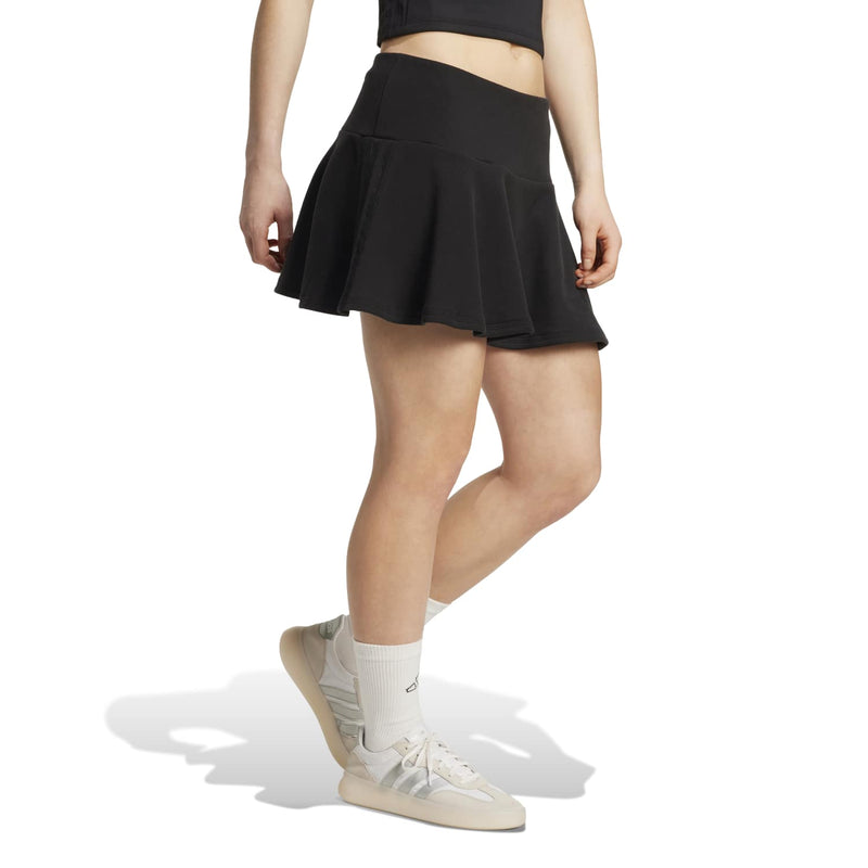 Women's black French terry skirt, back view, flared hem and seam detailing