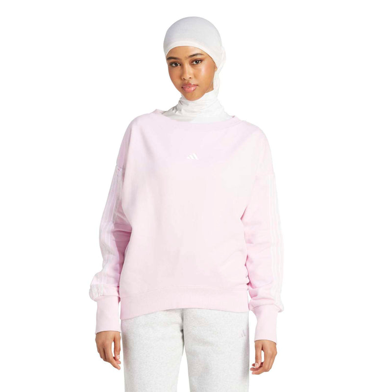 Women's clear pink loose sweatshirt with long sleeves and 3-stripes graphic on chest