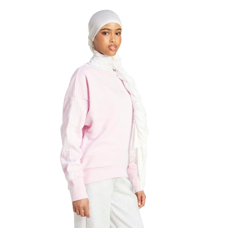 Clear pink loose sweatshirt with ribbed cuffs and hem, small chest logo, sleeve stripes