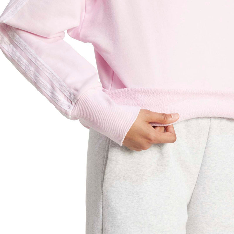 Clear pink sweatshirt sleeve detail with ribbed cuff and 3-stripes design