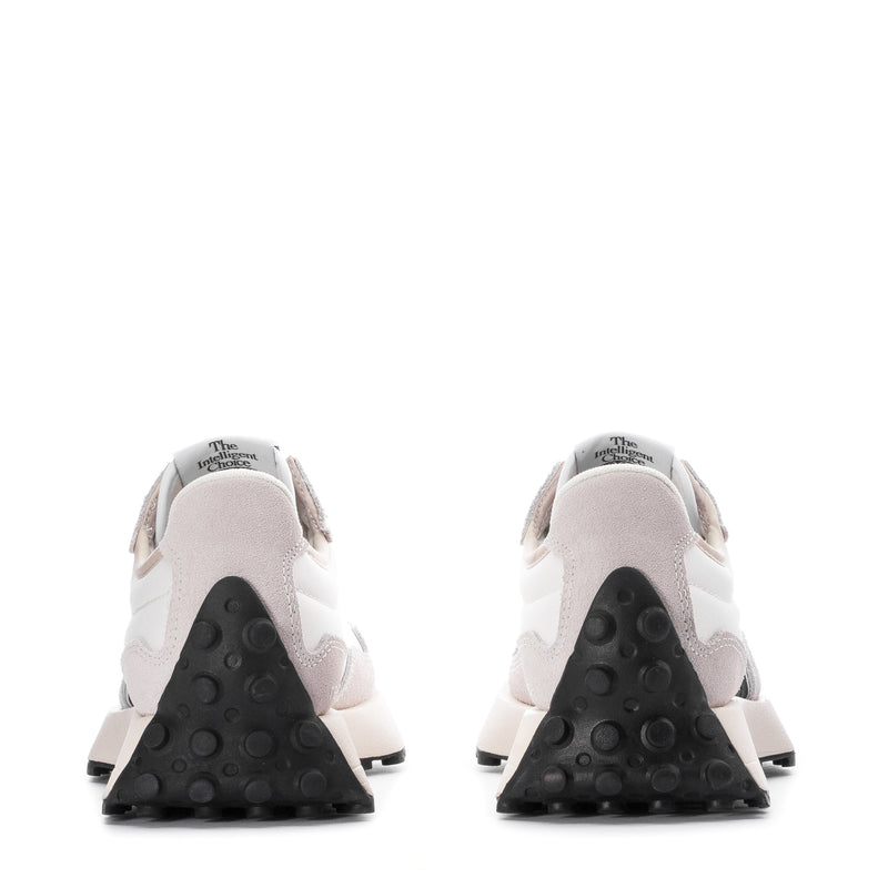Women's sneakers heel view, white upper with black outsole pods and logo