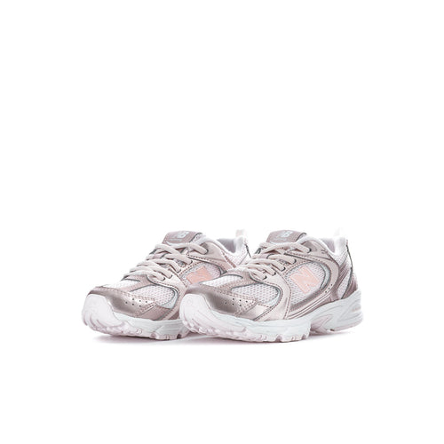 Kids lace-up running sneakers, shell pink and metallic with bold N logo and white sole