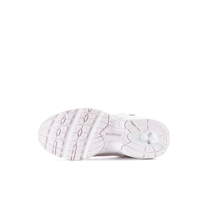 Kids running sneaker outsole view, white tread with molded channels and small logo