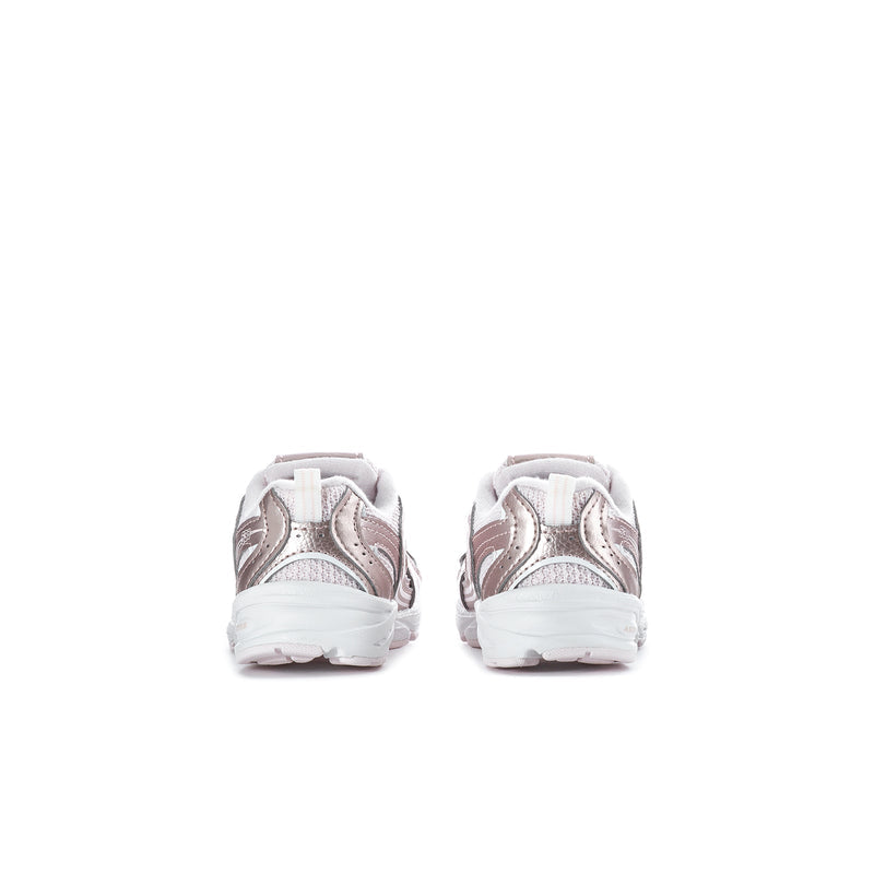 Toddler sneaker heel pair in light pink with padded backs and white soles