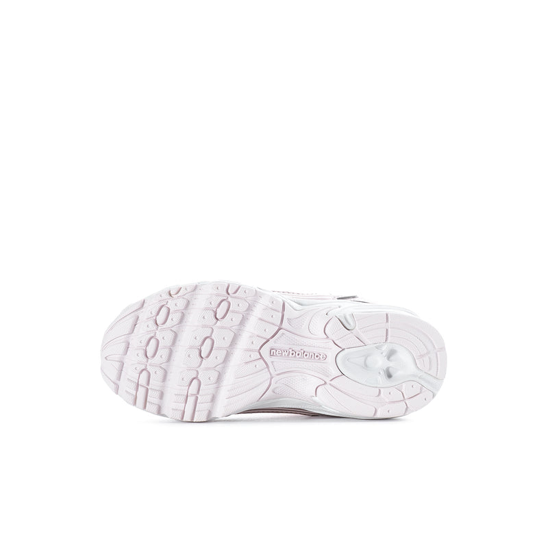 Toddler sneaker outsole in light pink and white with molded tread