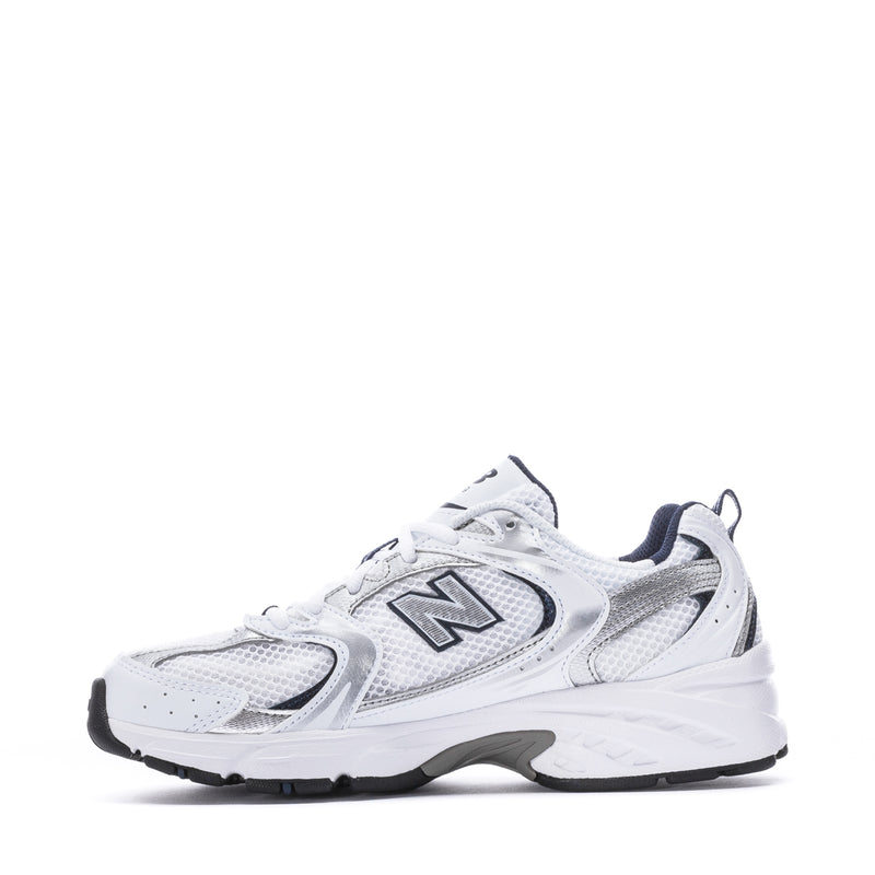 Women’s wide white sneakers with navy accents and large N logo, lace-up style.