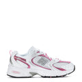 White and pink lace-up running shoe with N logo and sculpted midsole