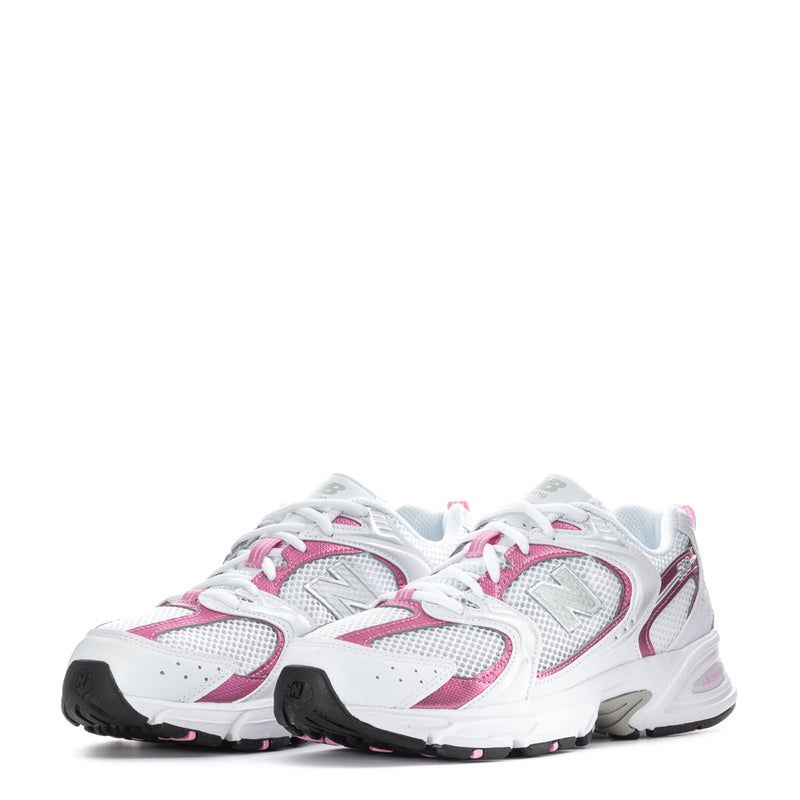 Pair of white and pink lace-up running sneakers with black accents on soles