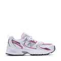 Youth lace-up running sneaker in white with pink accents, side/front view