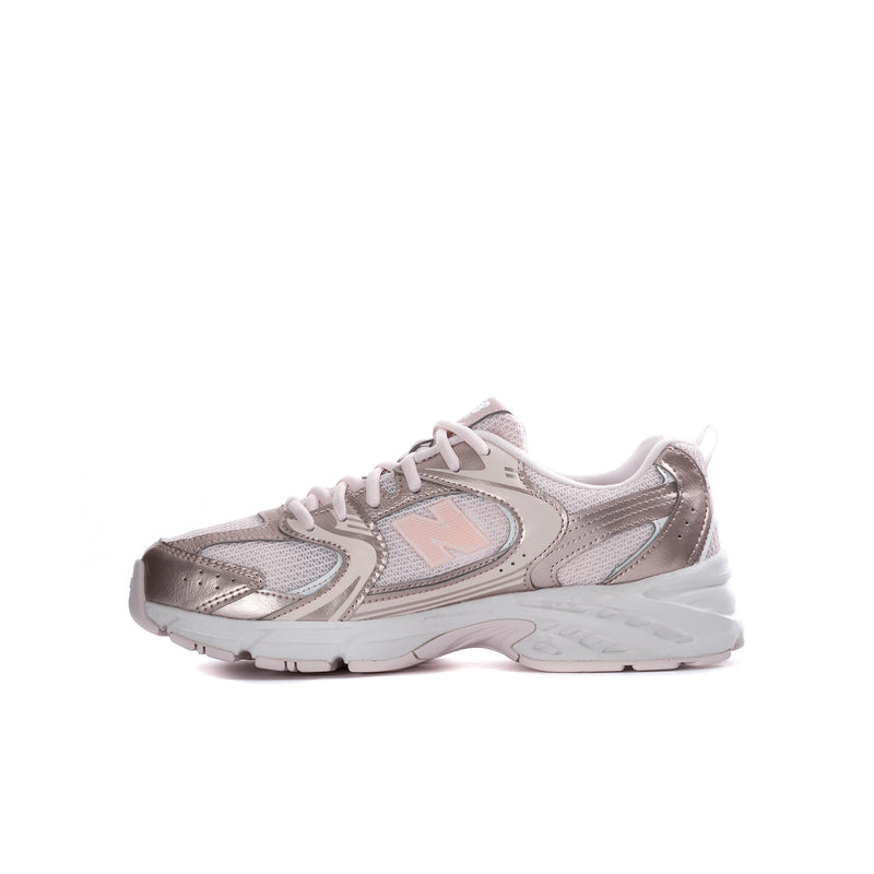 Youth light pink and metallic silver sneaker with N logo and lace-up closure.