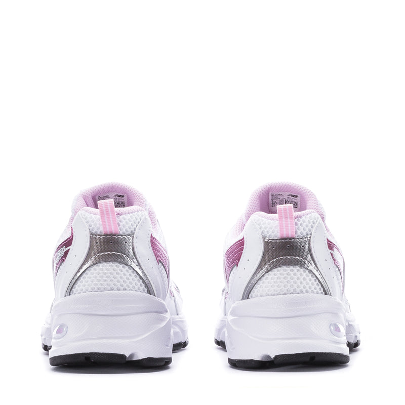 Youth sneaker heel view in white with pink accents, lace-up closure