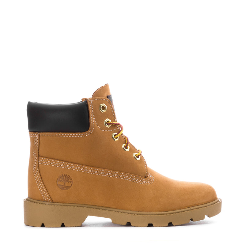 Kids tan nubuck lace-up boot with black collar and Timberland logo