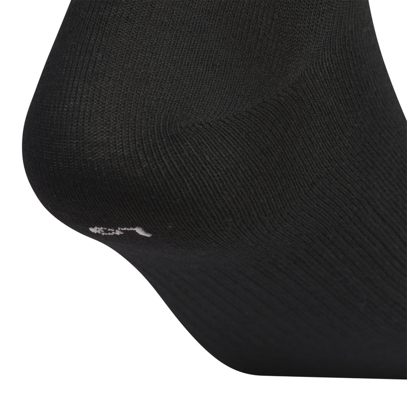 Black quarter sock close-up with small white logo on foot