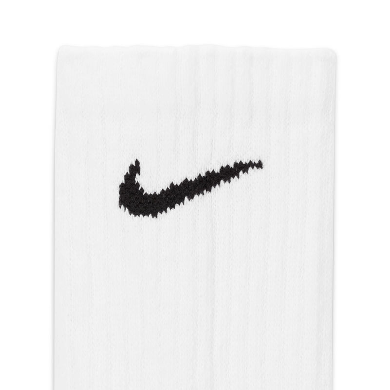 White crew sock with black Nike Swoosh logo, cushioned knit