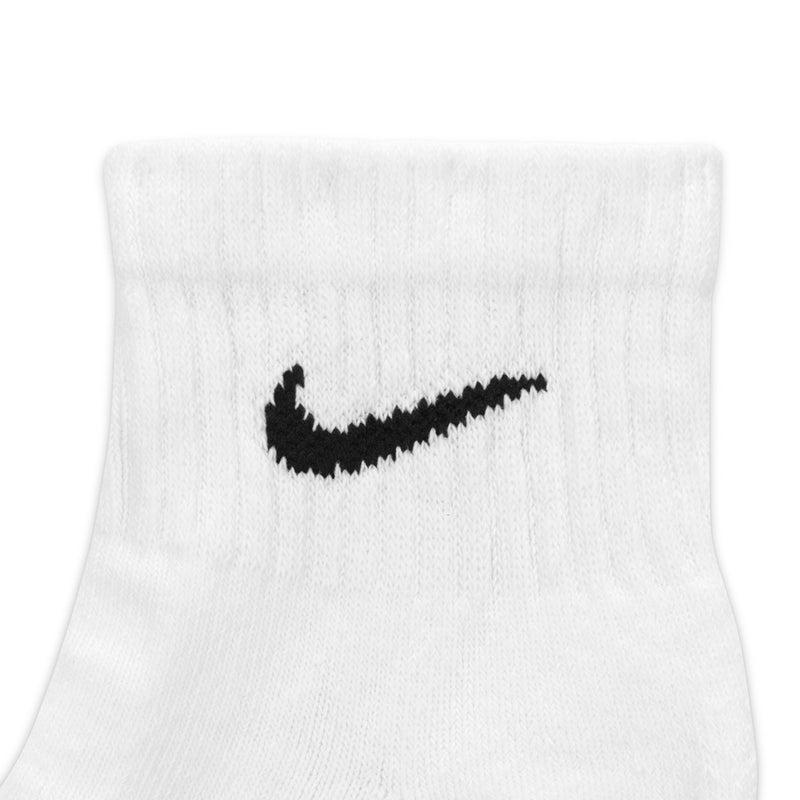 White cushioned quarter sock close-up with black Nike swoosh logo