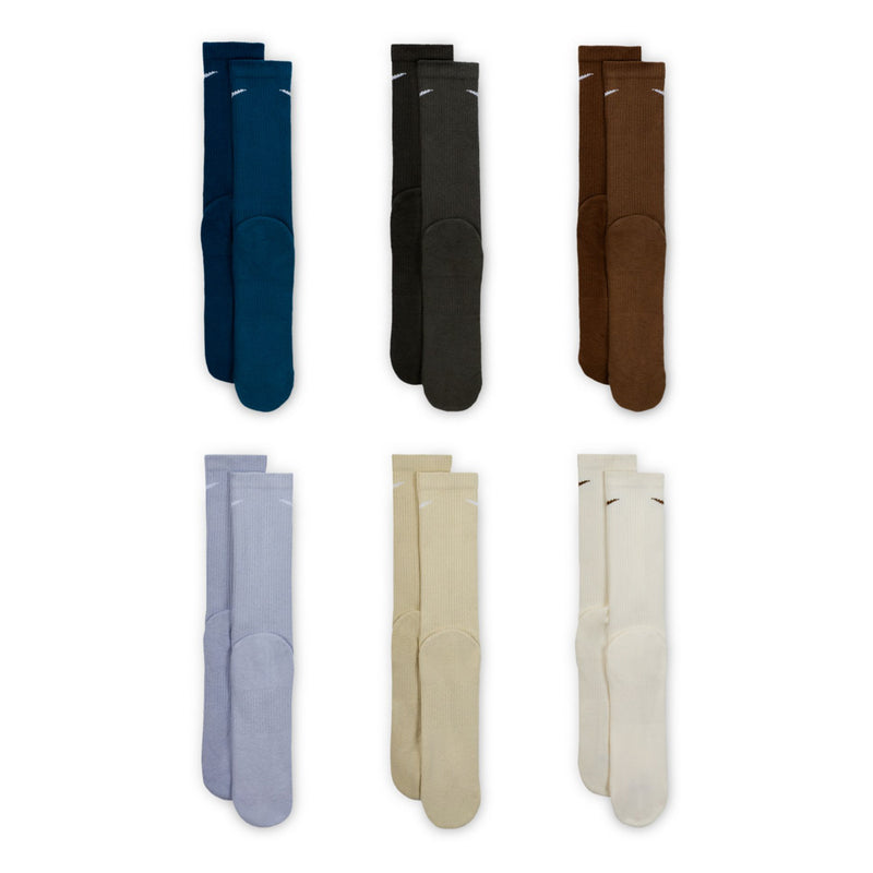 Six-pack unisex crew socks in assorted colors, shown folded upright