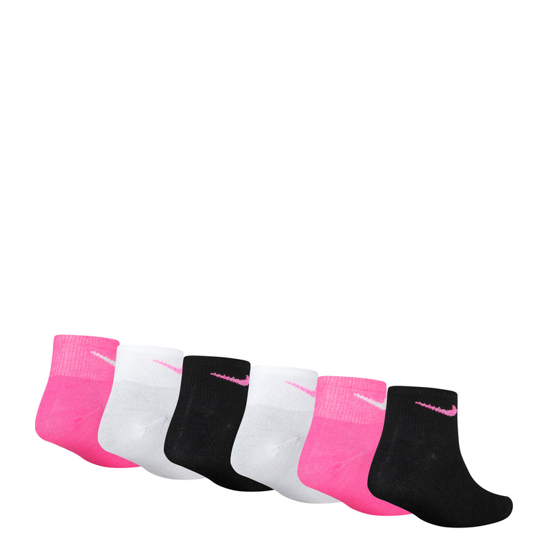 Six-pack quarter socks laid out: pink, white, and black with small swoosh marks