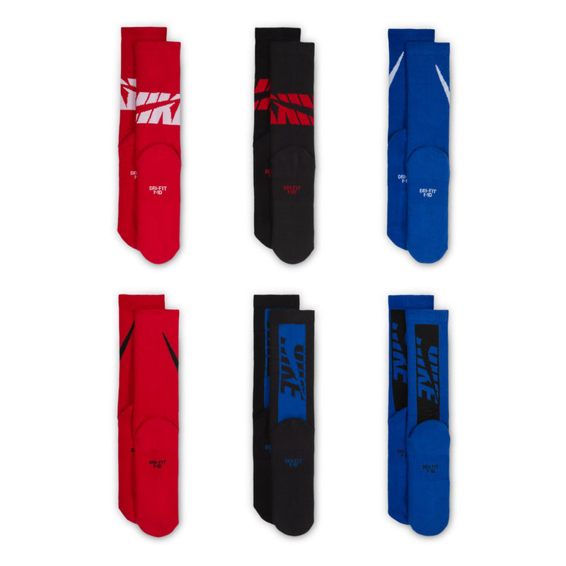 Youth crew socks 6-pack in red, black, and blue with swoosh-style logos.