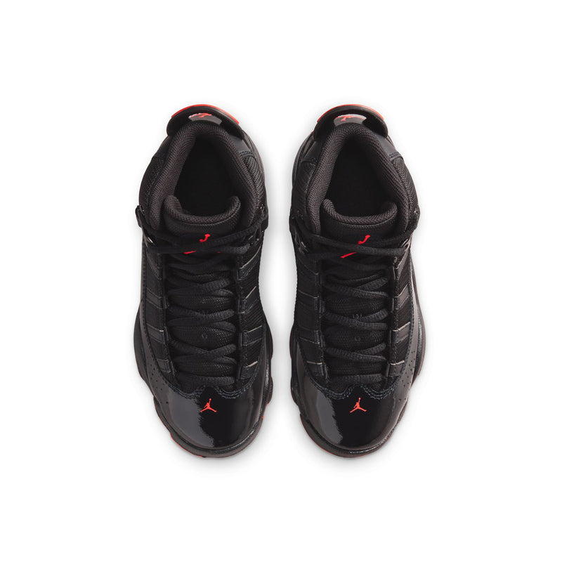 Kids black sneakers, lace-up with red Jumpman on tongue, front view
