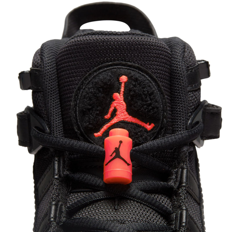 Youth black high-top shoe heel with embroidered Jumpman logo and orange-red heel tab