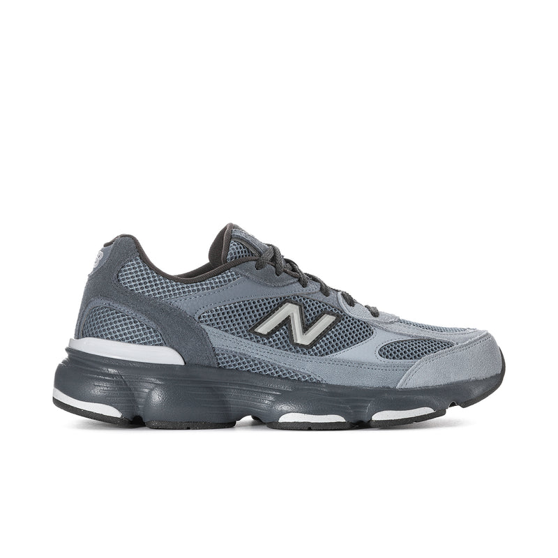 Mens athletic sneakers in blue and gray, mesh upper with side N logo and black sole