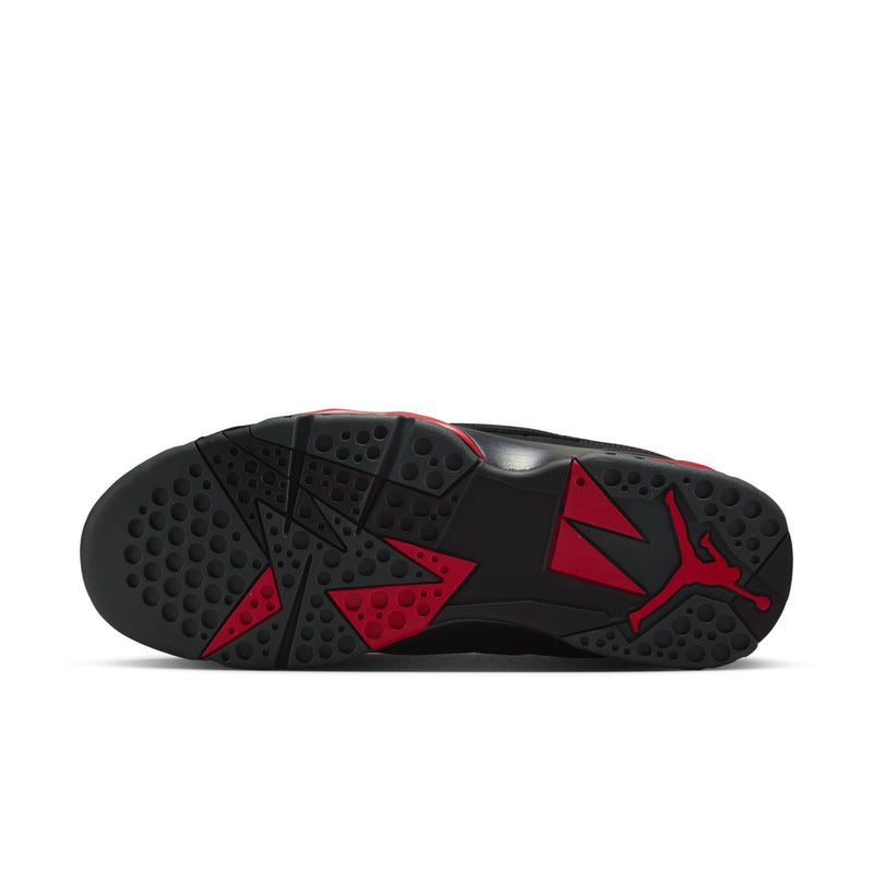 Men's black sneaker outsole with red traction pods and Air Jordan side logo