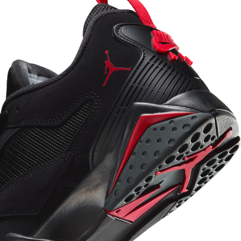 Men's black sneaker with red Jordan detail and textured toe-cap ventilation holes