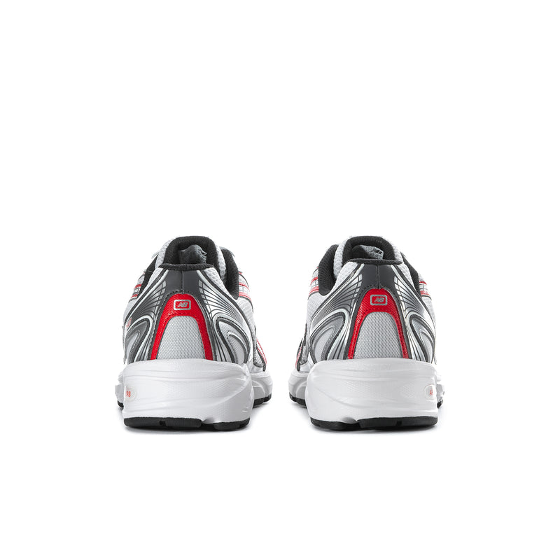 Back view of white, silver and red athletic shoes with black heel tab and white sole