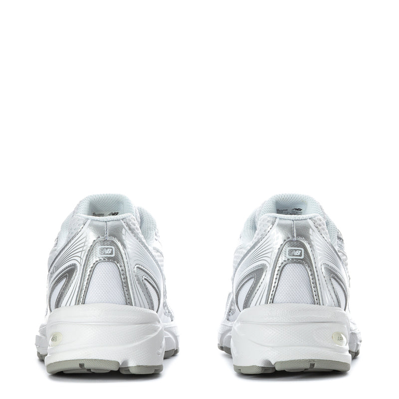 Youth 740 sneakers back view in white and silver metallic, cushioned heel collar