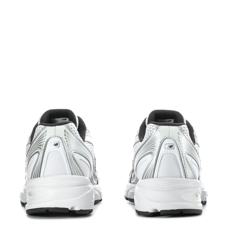 Silver youth running sneakers, rear view, cushioned heel, black collar